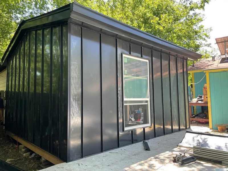 Black standing seam metal wall panels for Roof Inspection in Wilmette