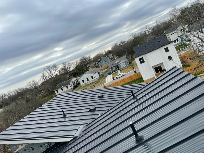Standing seam metal roof panels with vents for Skylight Repair in Wilmette